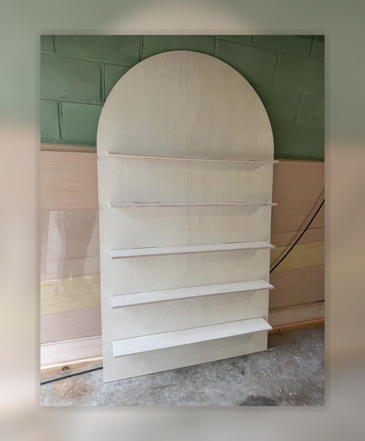 Arched event display shelf